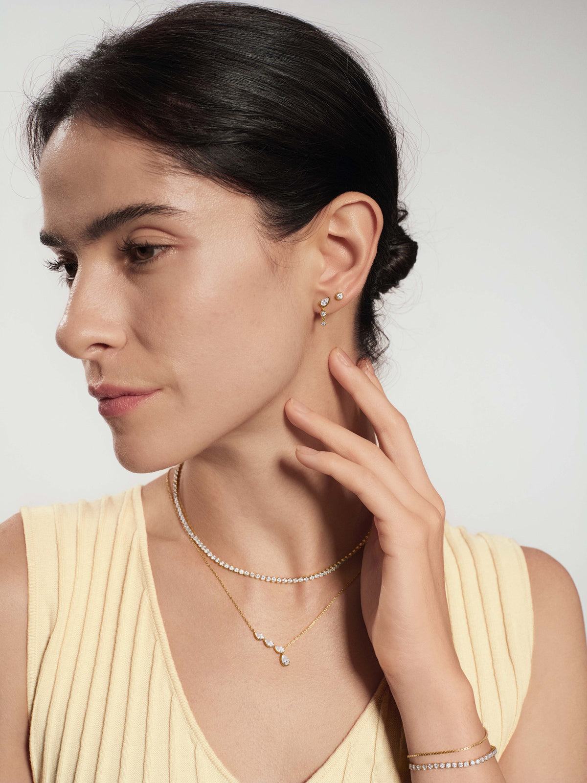 Gold Teardrop & Bezel Round Dangle Stud Earrings – model view