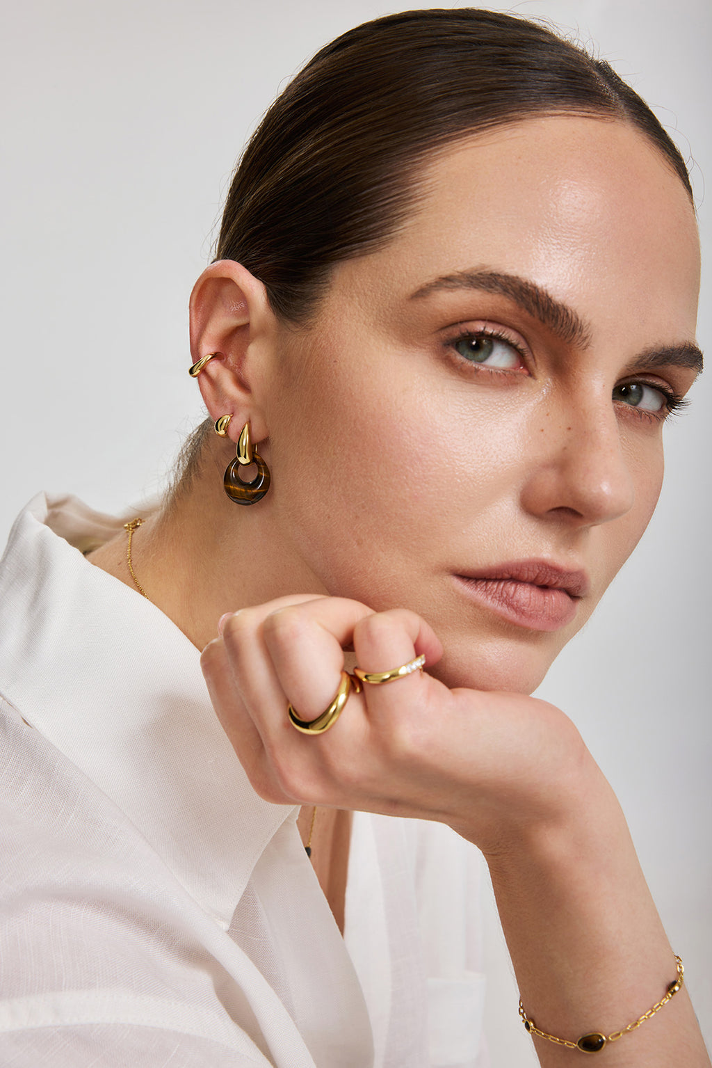 Gold Organic Dome Pebble Huggie Hoop Earrings – model view