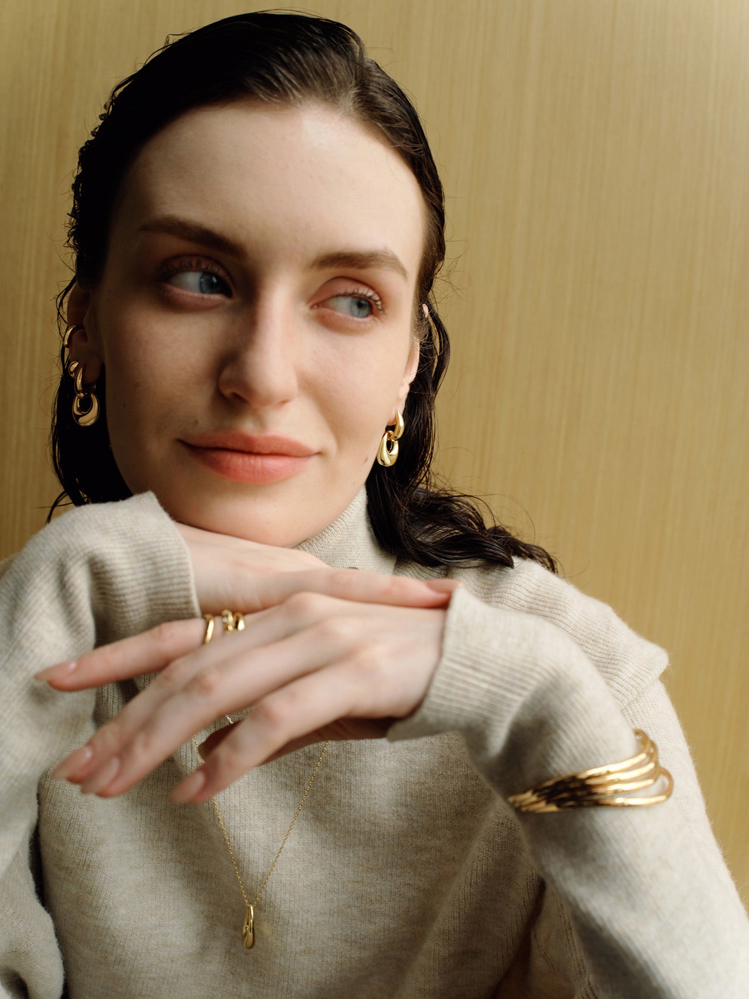 Gold Organic Dome Pebble Huggie Hoop Earrings – model view