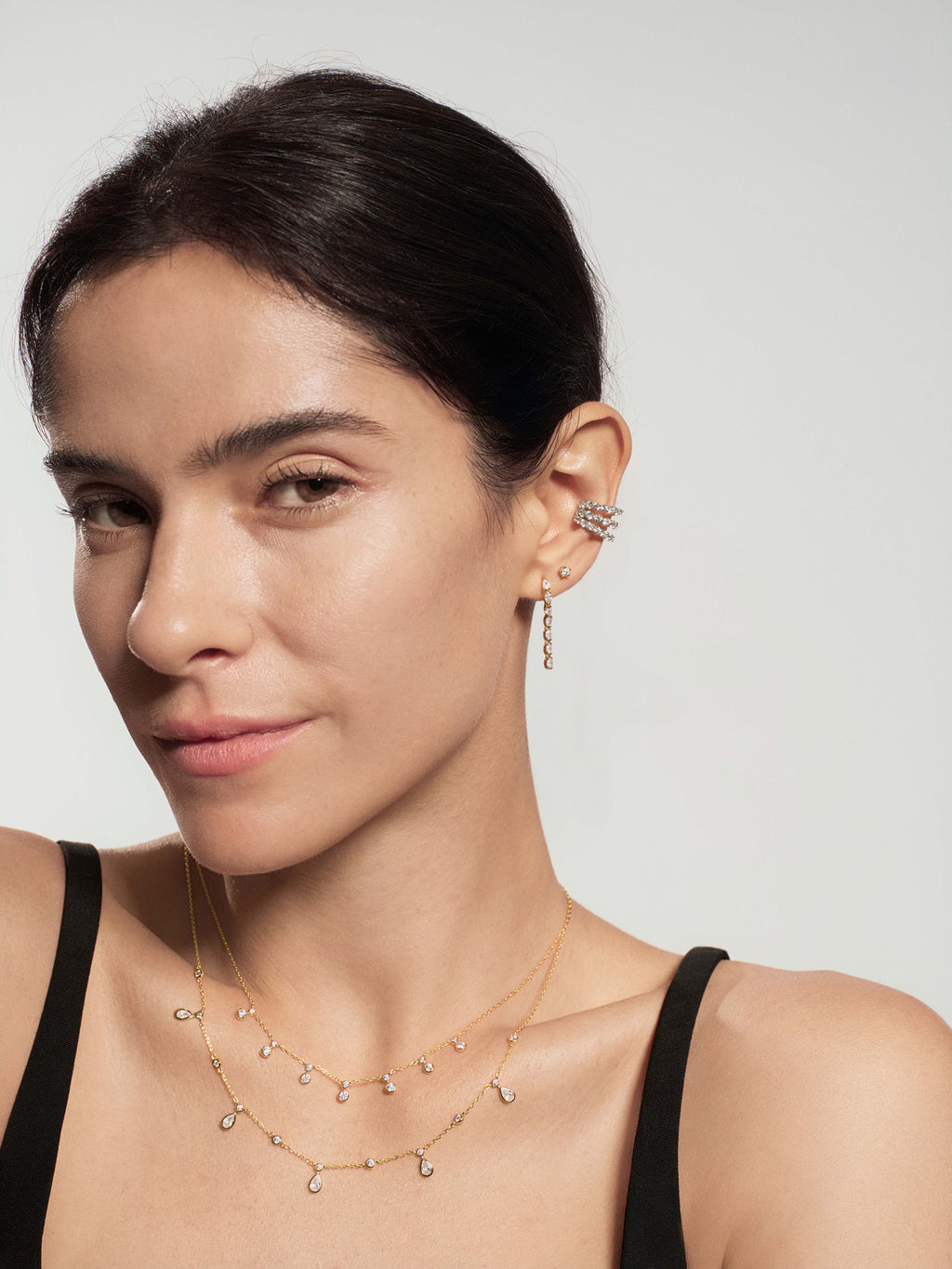 Gold Half-Bezel Oval Linear Dangle Stud Earrings – model view