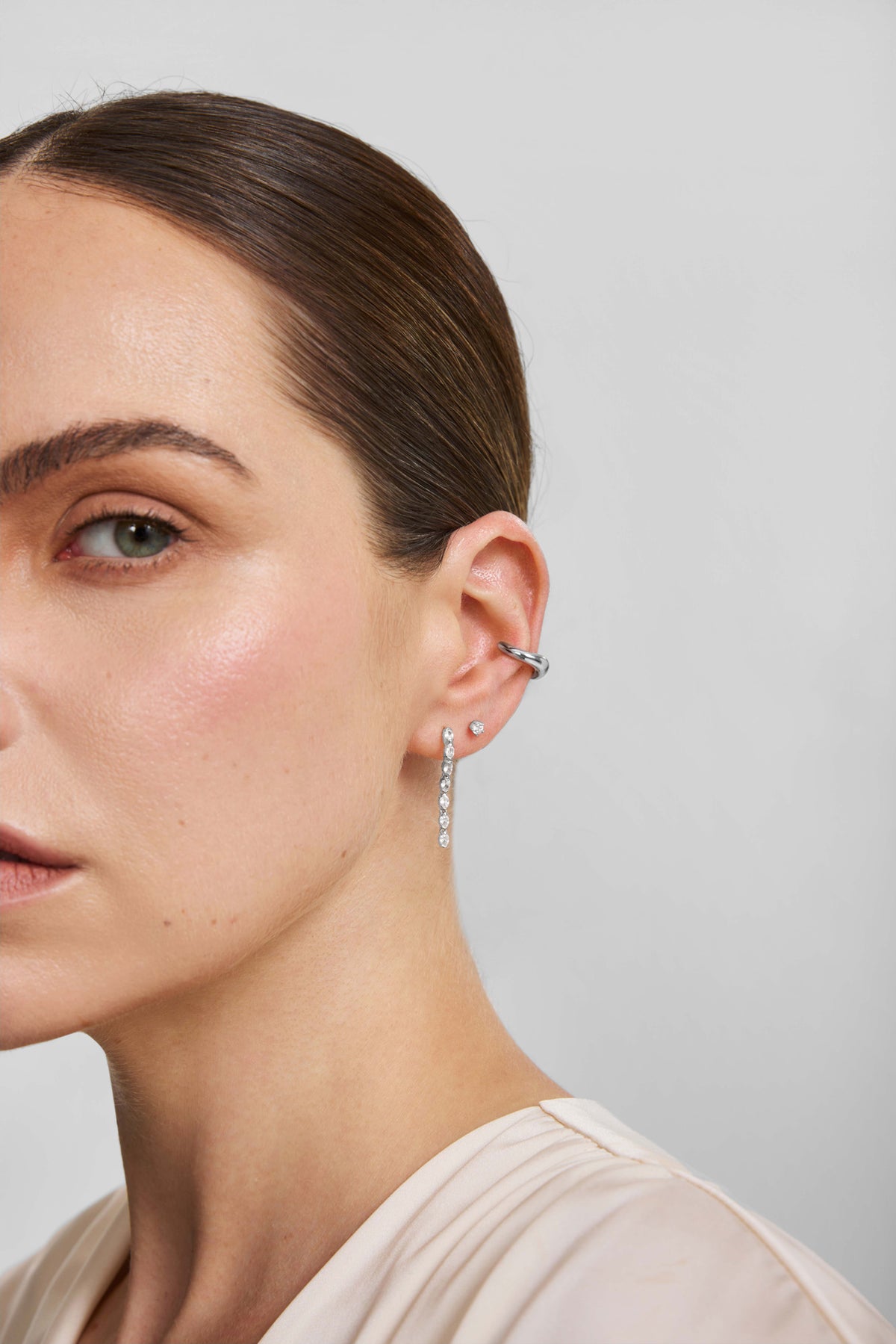 Silver Half-Bezel Oval Linear Dangle Stud Earrings – model view