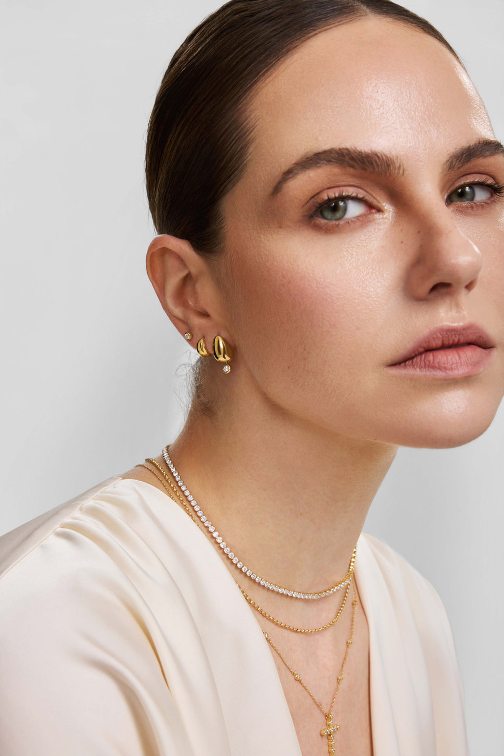 Gold Organic Dome Pebble Huggie Hoop Earrings – model view