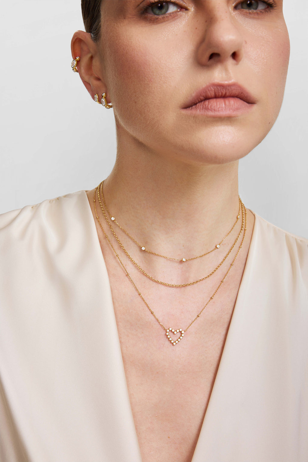 Gold Bezel-Set Round Open Heart Necklace – model view