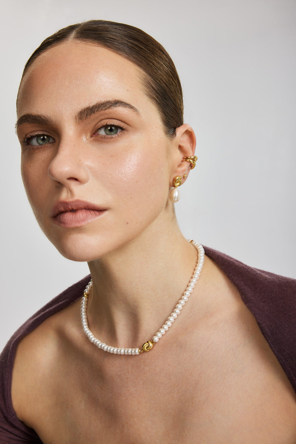 Gold Twist & Shell Pearl Drop Stud Earrings – model view