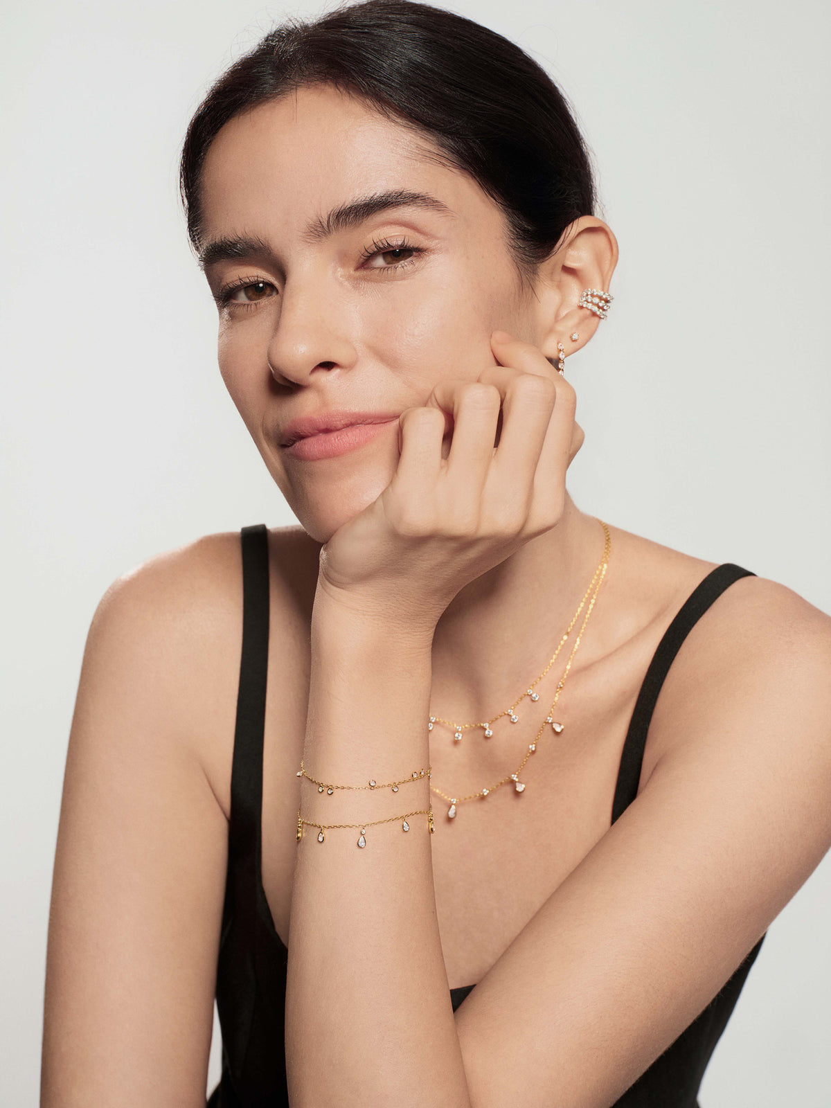 Gold Bezel-Set Droplet Station Bracelet – model view