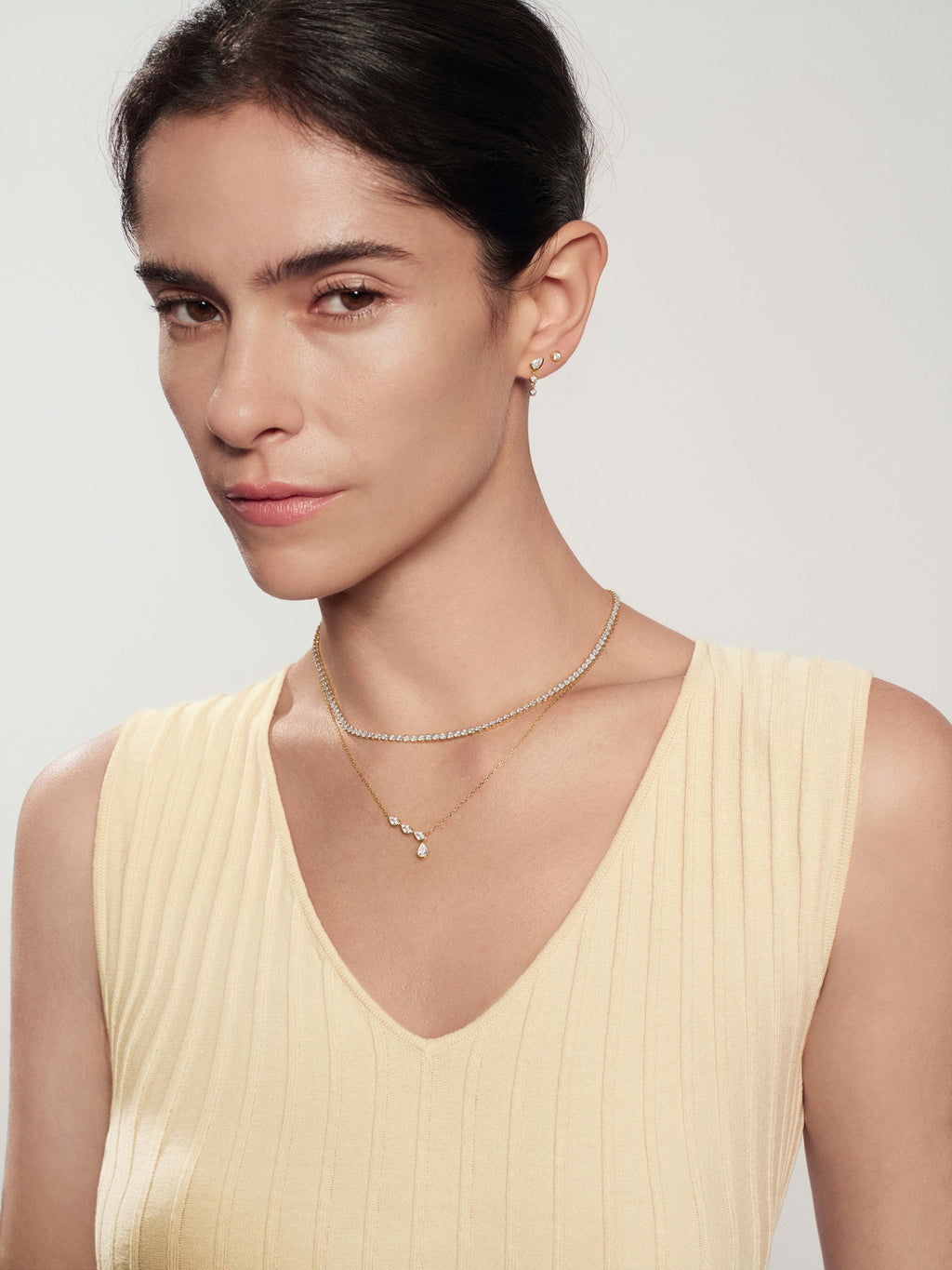 Gold Teardrop & Bezel Round Dangle Stud Earrings – model view