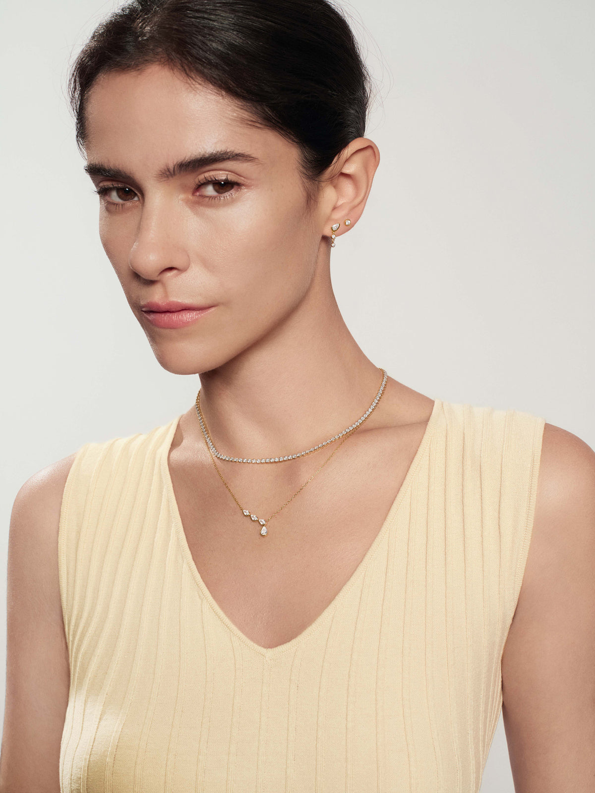 Gold Teardrop & Bezel Round Dangle Stud Earrings – model view