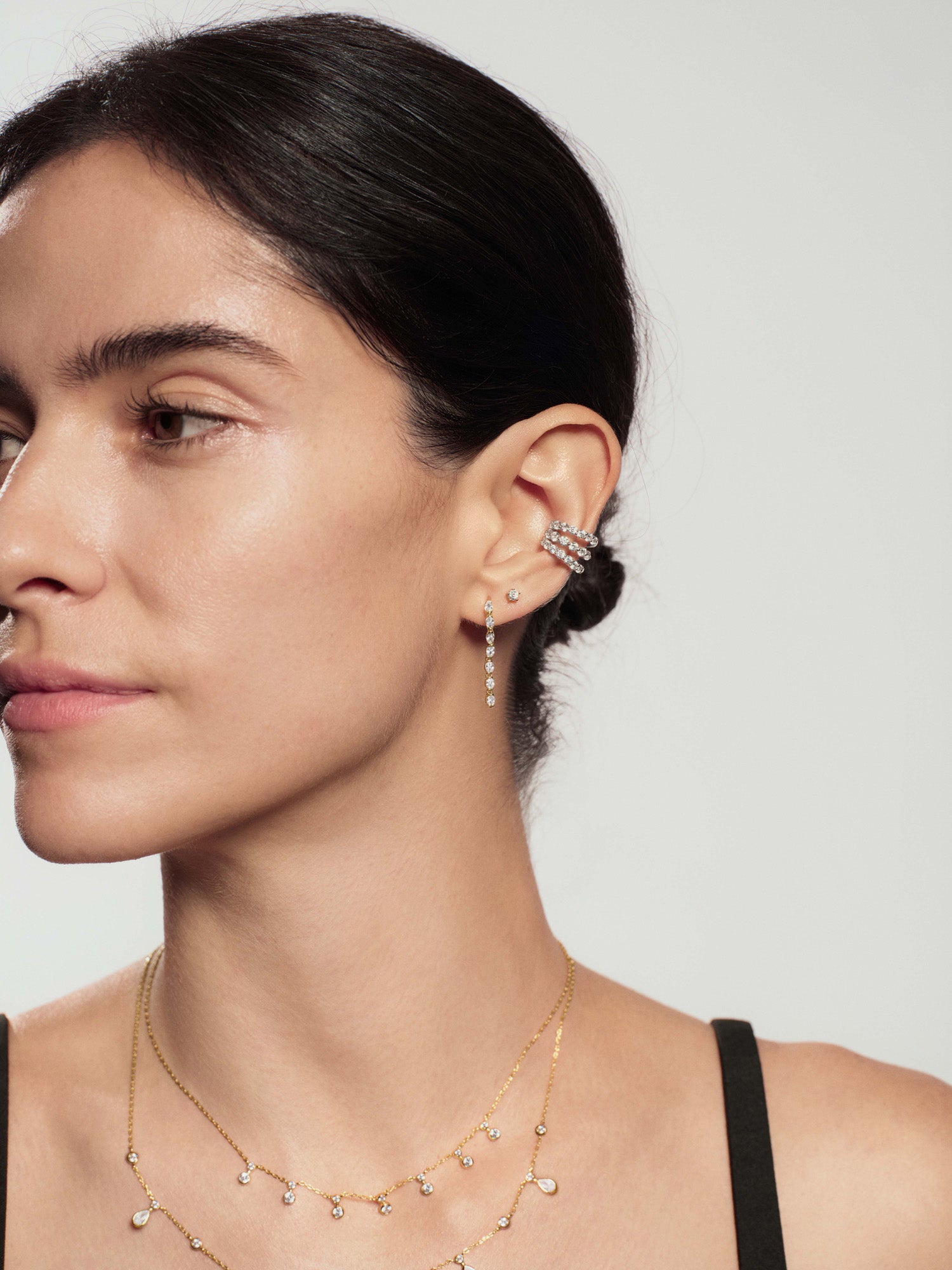 Gold Half-Bezel Oval Linear Dangle Stud Earrings – model view