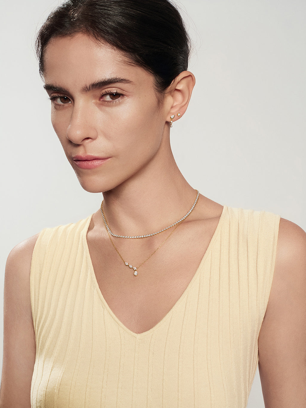 Gold Teardrop & Bezel Round Dangle Stud Earrings – model view