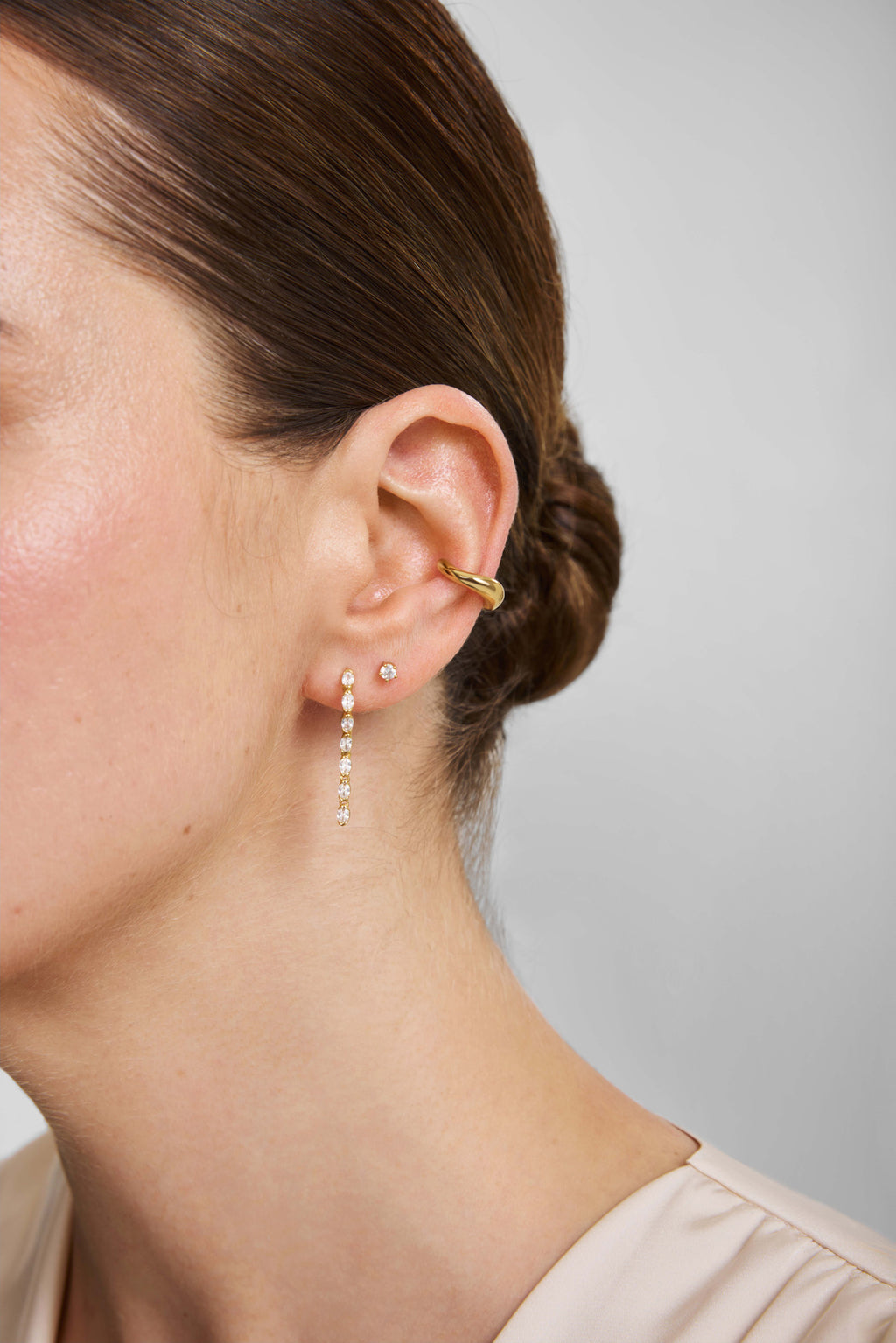Gold Half-Bezel Oval Linear Dangle Stud Earrings – model view