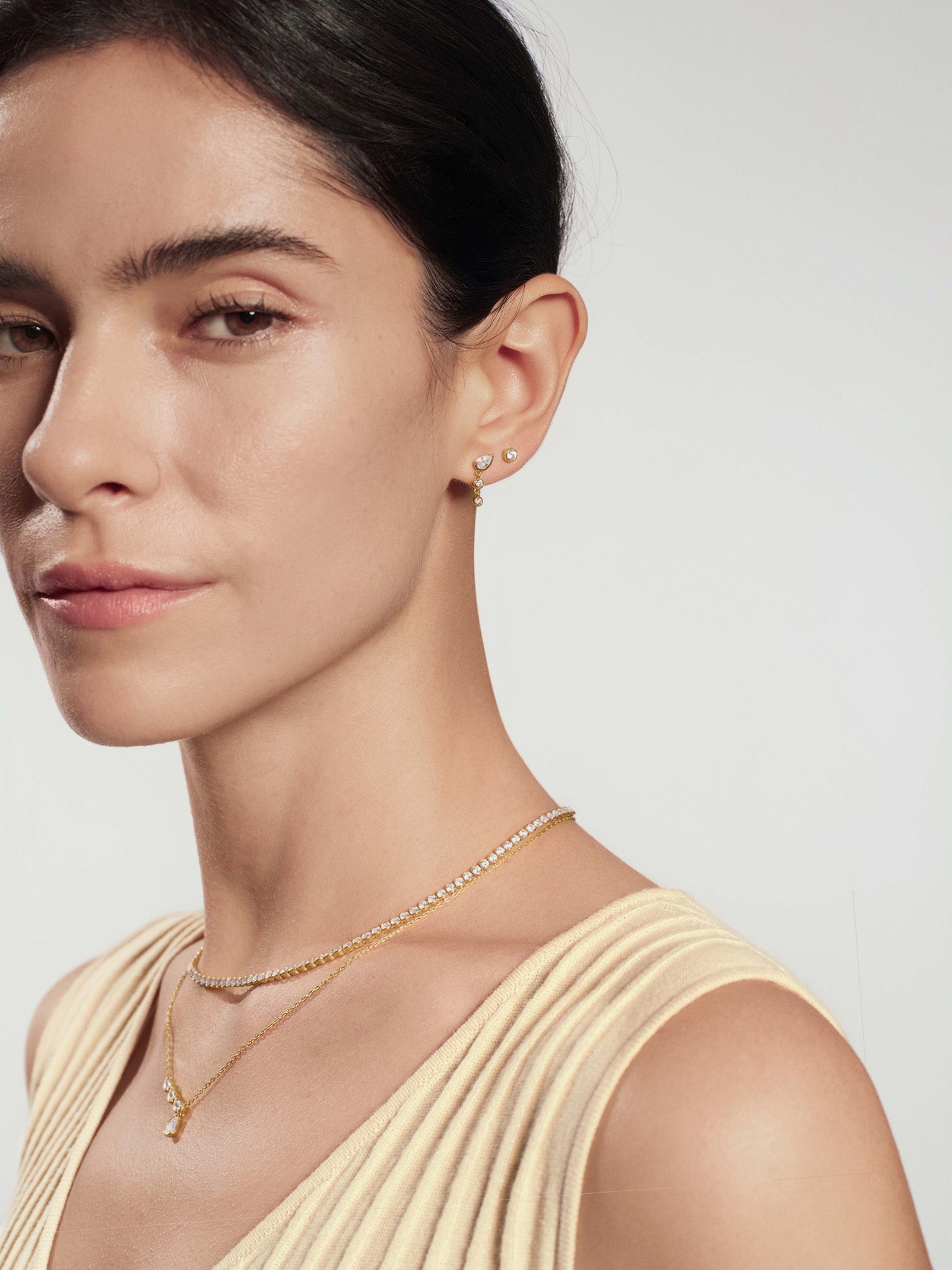 Gold Teardrop & Bezel Round Dangle Stud Earrings – model view